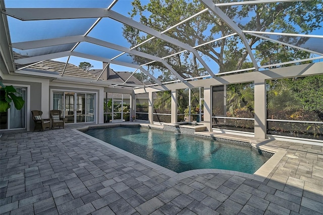 view of pool featuring a lanai and a patio area