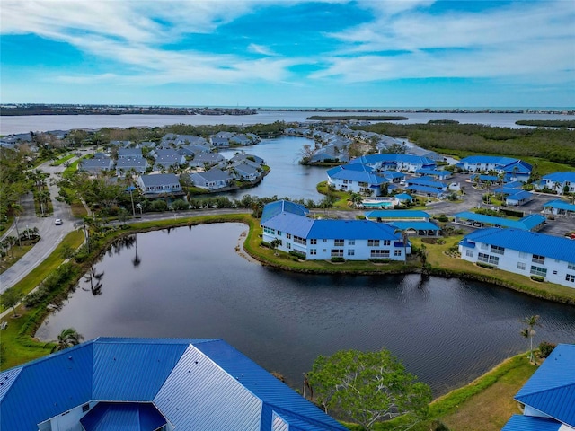 drone / aerial view featuring a water view