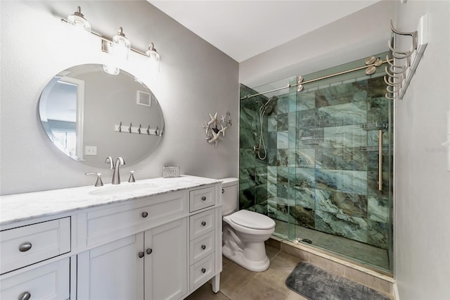 bathroom featuring tile patterned flooring, vanity, toilet, and a shower with door