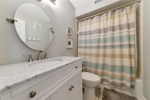 full bathroom featuring tile patterned flooring, vanity, toilet, and shower / bath combo