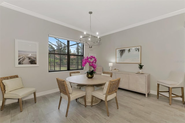 dining space featuring crown molding, light wood-type flooring, and an inviting chandelier