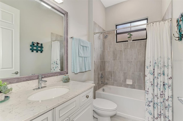 full bathroom with shower / bath combo, vanity, and toilet