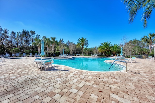 view of swimming pool featuring a patio