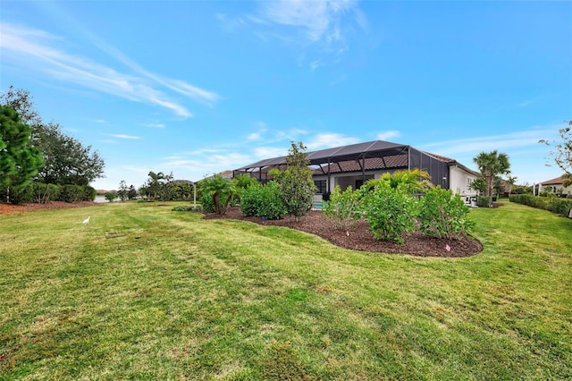 view of yard with a lanai