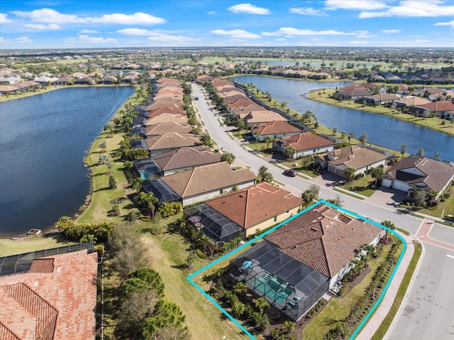 7130 Whittlebury Trl, Bradenton, FL 34202 - aerial perspective of suburban area with a nearby body of water and property boundaries highlighted