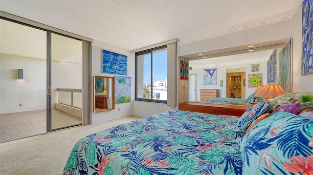 bedroom featuring floor to ceiling windows, a textured ceiling, and carpet flooring