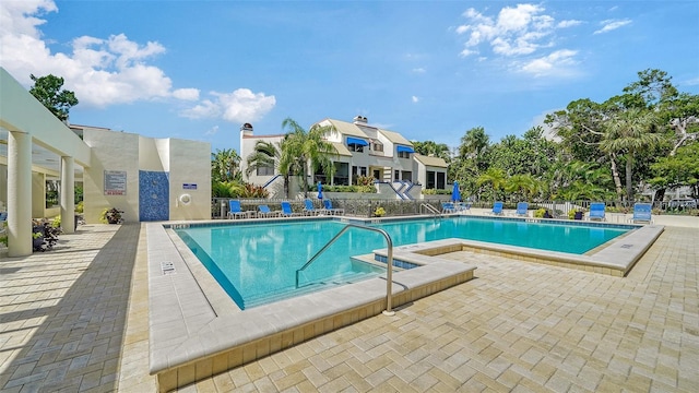 view of swimming pool featuring a patio