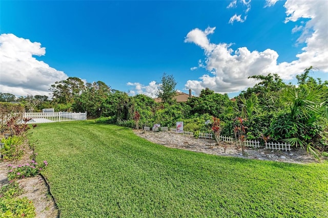 view of yard with fence