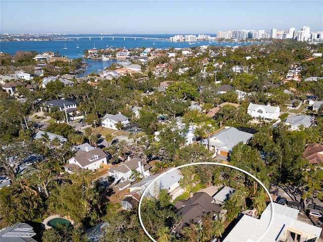 birds eye view of property featuring a water view