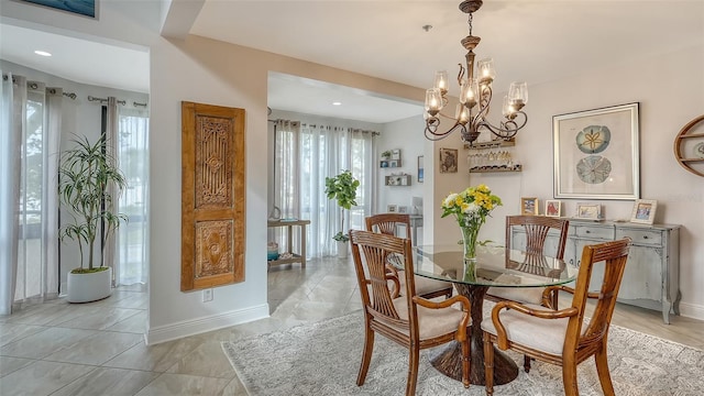 dining space featuring a chandelier