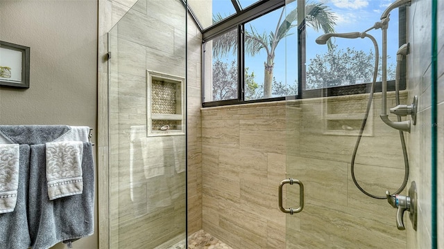 bathroom featuring an enclosed shower