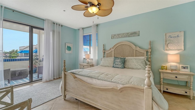 bedroom with access to outside, ceiling fan, and light tile patterned flooring