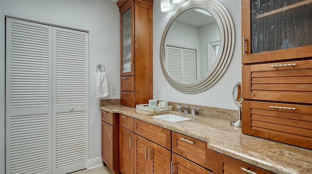 bathroom with vanity and tile patterned floors