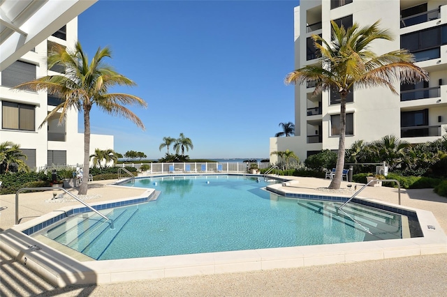 view of swimming pool with a patio area