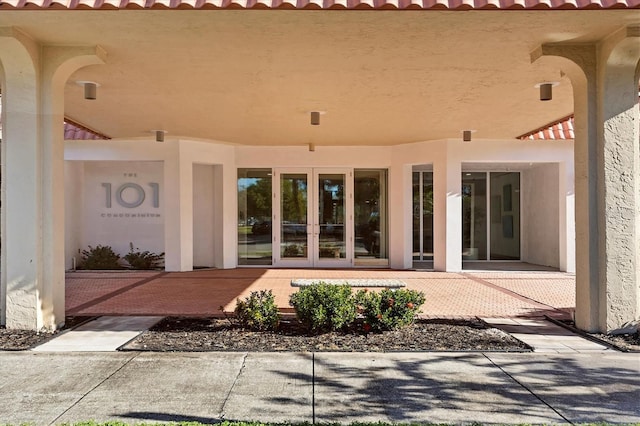 exterior space with a patio area and french doors