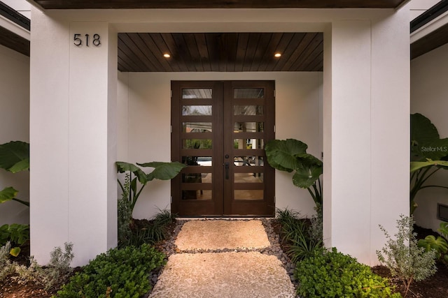 entrance to property featuring french doors