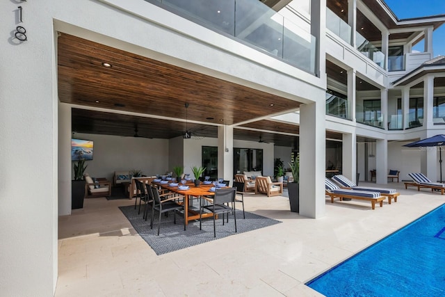 view of patio with ceiling fan