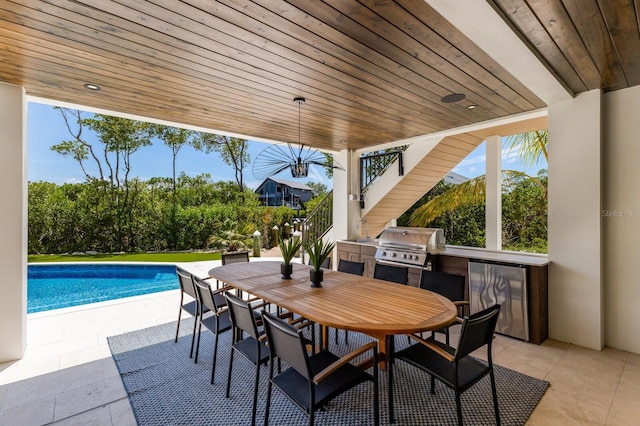 view of patio / terrace featuring grilling area and exterior kitchen