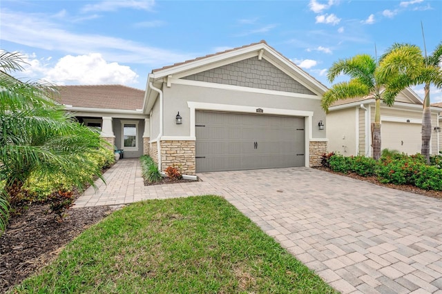 view of front of home with a garage