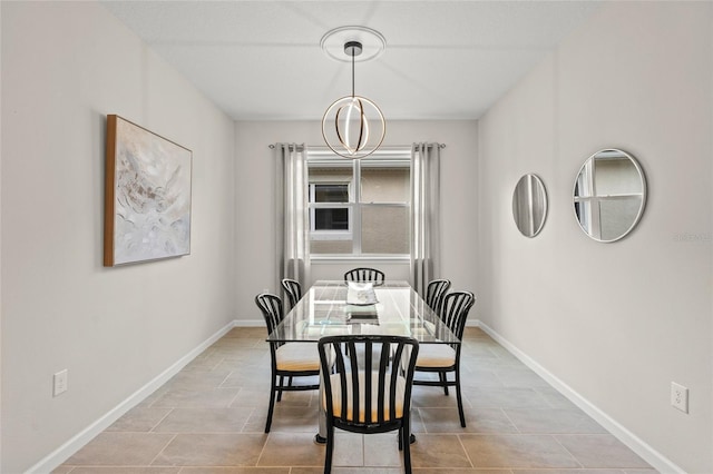 dining area with a notable chandelier