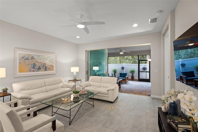 living room featuring ceiling fan