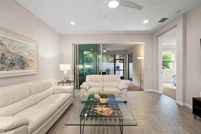 living room featuring ceiling fan