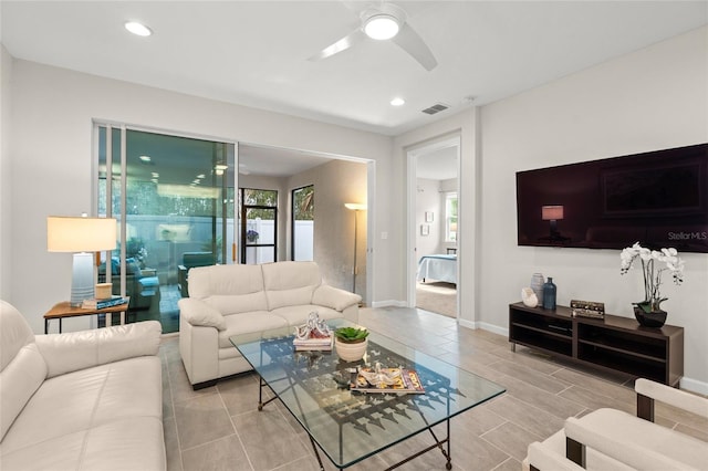 living room with ceiling fan