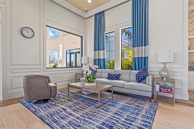 living room featuring crown molding