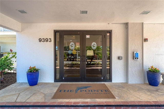 entrance to property with french doors