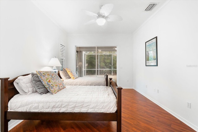 108 Corte Del Rosa, Venice, FL 34285 - bedroom with access to exterior, wood finished floors, ornamental molding, and ceiling fan