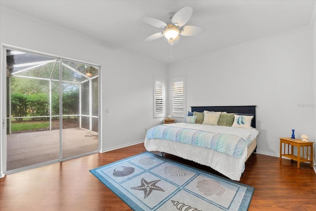 bedroom with access to outside, ceiling fan, and dark wood-type flooring