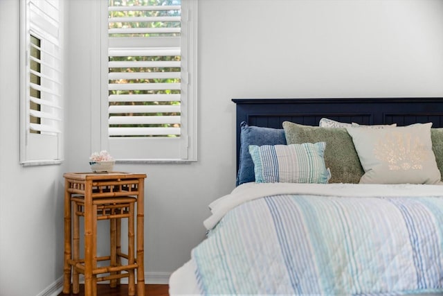 108 Corte Del Rosa, Venice, FL 34285 - bedroom featuring wood finished floors and baseboards