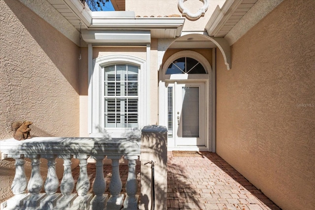 108 Corte Del Rosa, Venice, FL 34285 - entrance to property featuring stucco siding