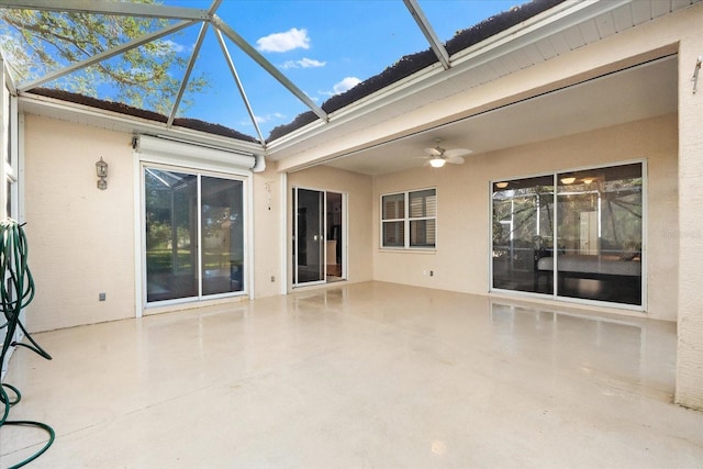 exterior space with ceiling fan