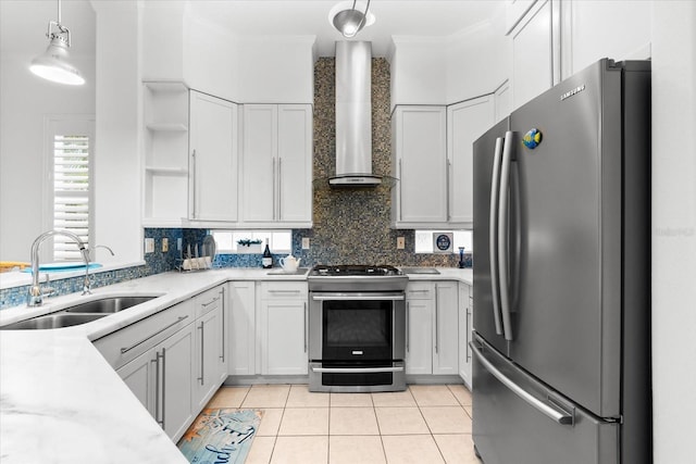 108 Corte Del Rosa, Venice, FL 34285 - kitchen featuring appliances with stainless steel finishes, wall chimney range hood, open shelves, decorative backsplash, and light tile patterned flooring
