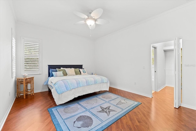 108 Corte Del Rosa, Venice, FL 34285 - bedroom featuring wood finished floors, a ceiling fan, and crown molding