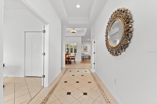 corridor with light tile patterned floors