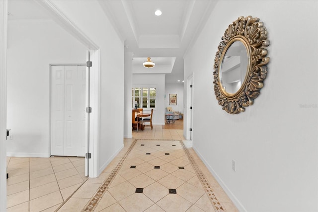 108 Corte Del Rosa, Venice, FL 34285 - corridor with light tile patterned floors, recessed lighting, and a tray ceiling
