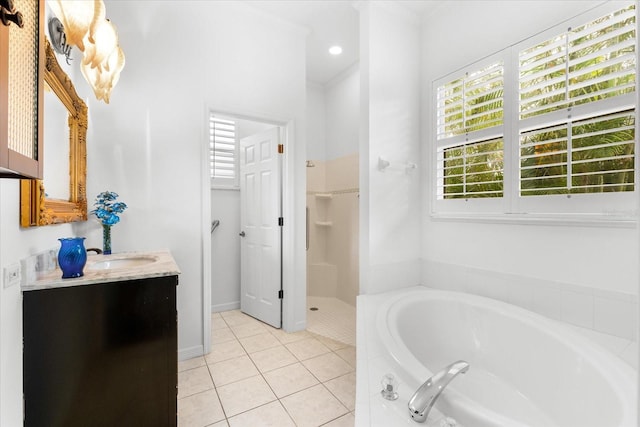 bathroom featuring tile patterned floors, crown molding, vanity, and independent shower and bath