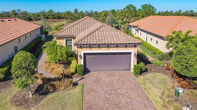 view of front of property featuring a garage