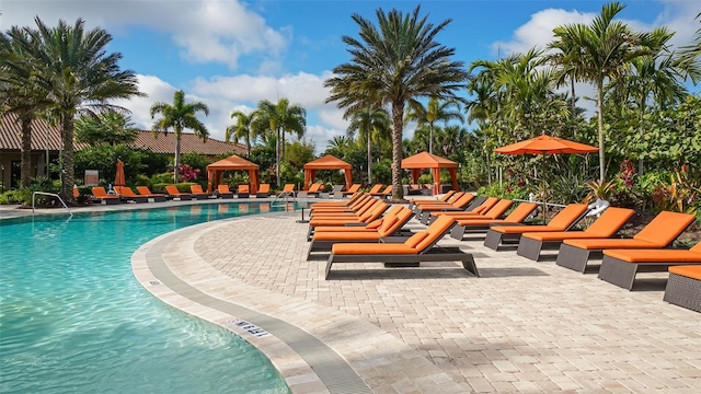 view of swimming pool featuring a gazebo and a patio area