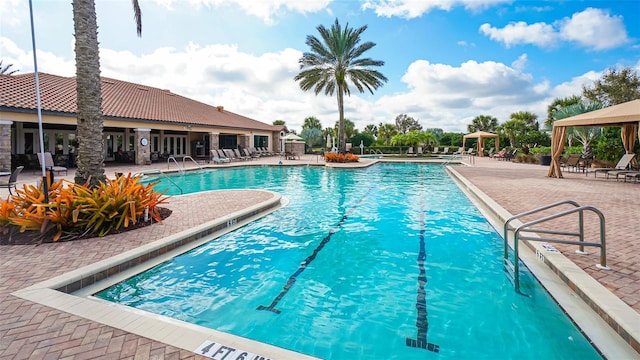 view of pool with a gazebo and a patio area