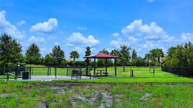 view of property's community featuring a lawn and a gazebo