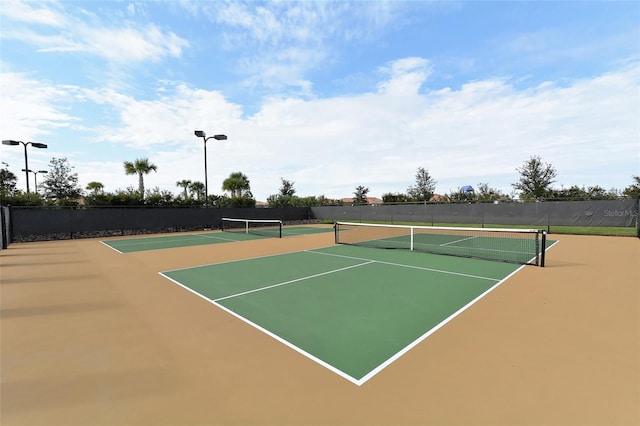 view of tennis court with basketball court