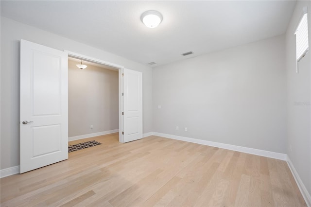 unfurnished bedroom with light hardwood / wood-style flooring