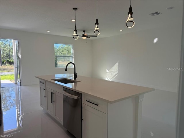 kitchen featuring dishwasher, hanging light fixtures, a center island with sink, white cabinets, and sink