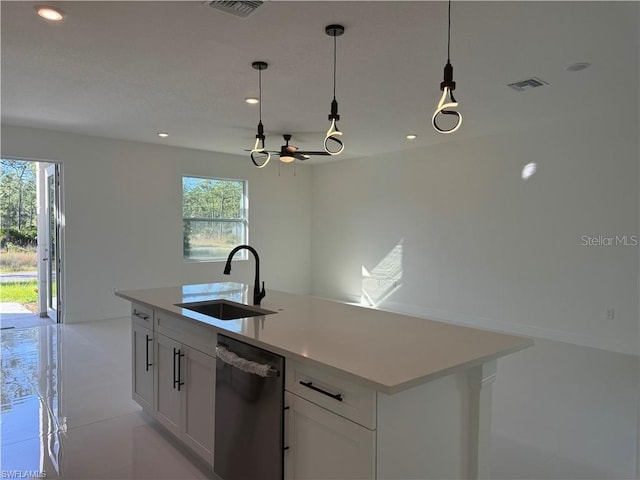 kitchen with dishwasher, hanging light fixtures, a kitchen island with sink, white cabinets, and sink