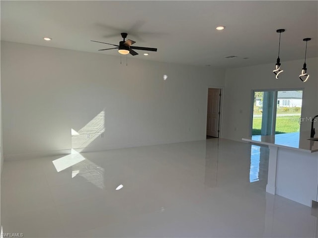 empty room featuring ceiling fan