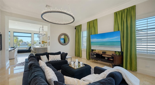 living room with crown molding and a chandelier