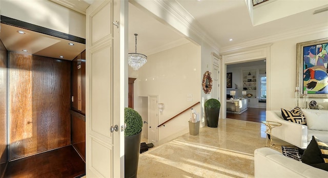 hallway with a notable chandelier, crown molding, and elevator